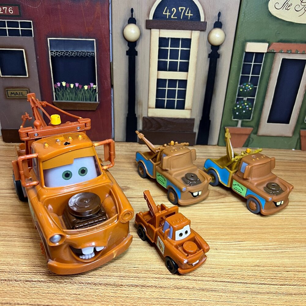 Lot of 4 Disney Pixar Car Tow Mater Radiator Springs Trucks